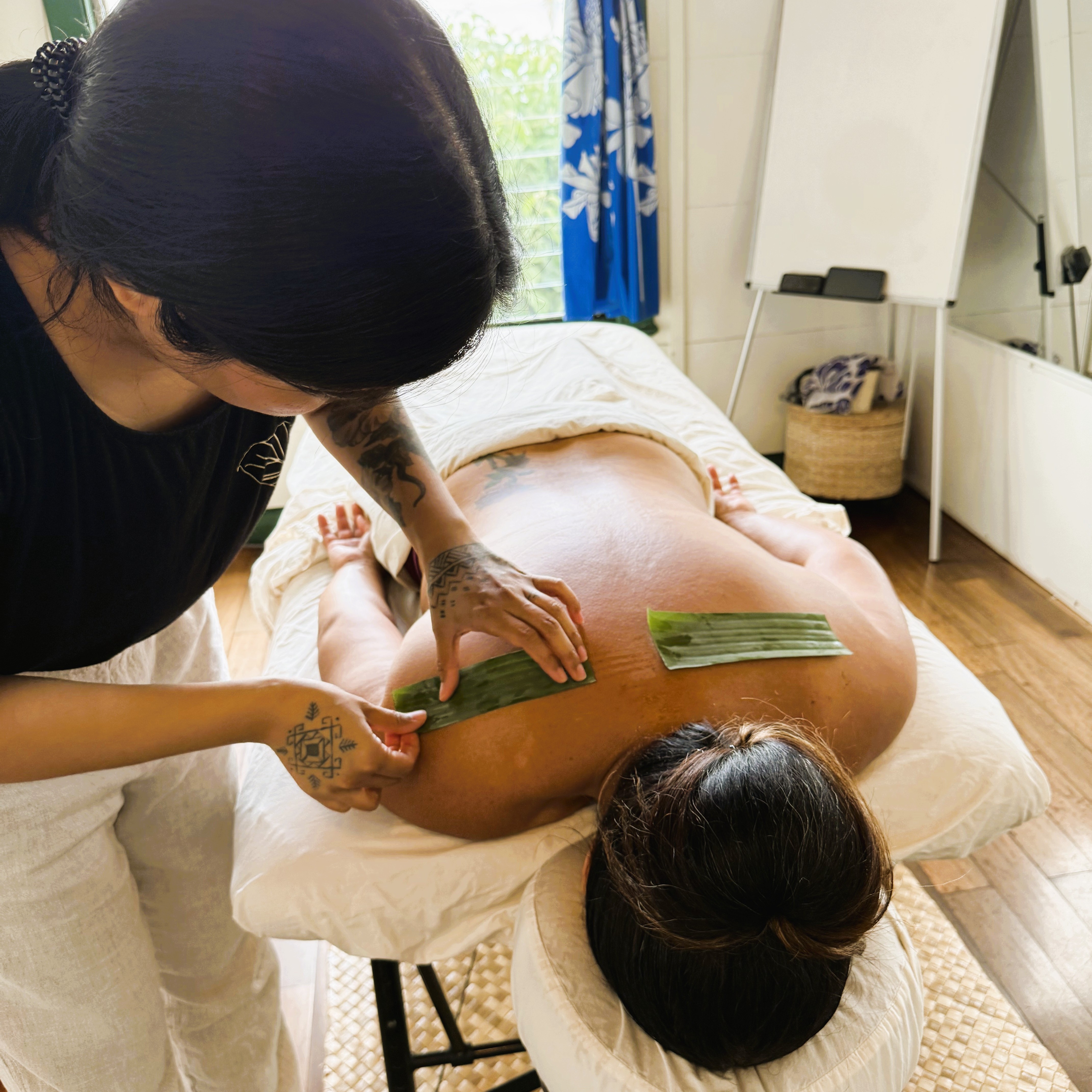 Melody doing banana leaf scan on a client
